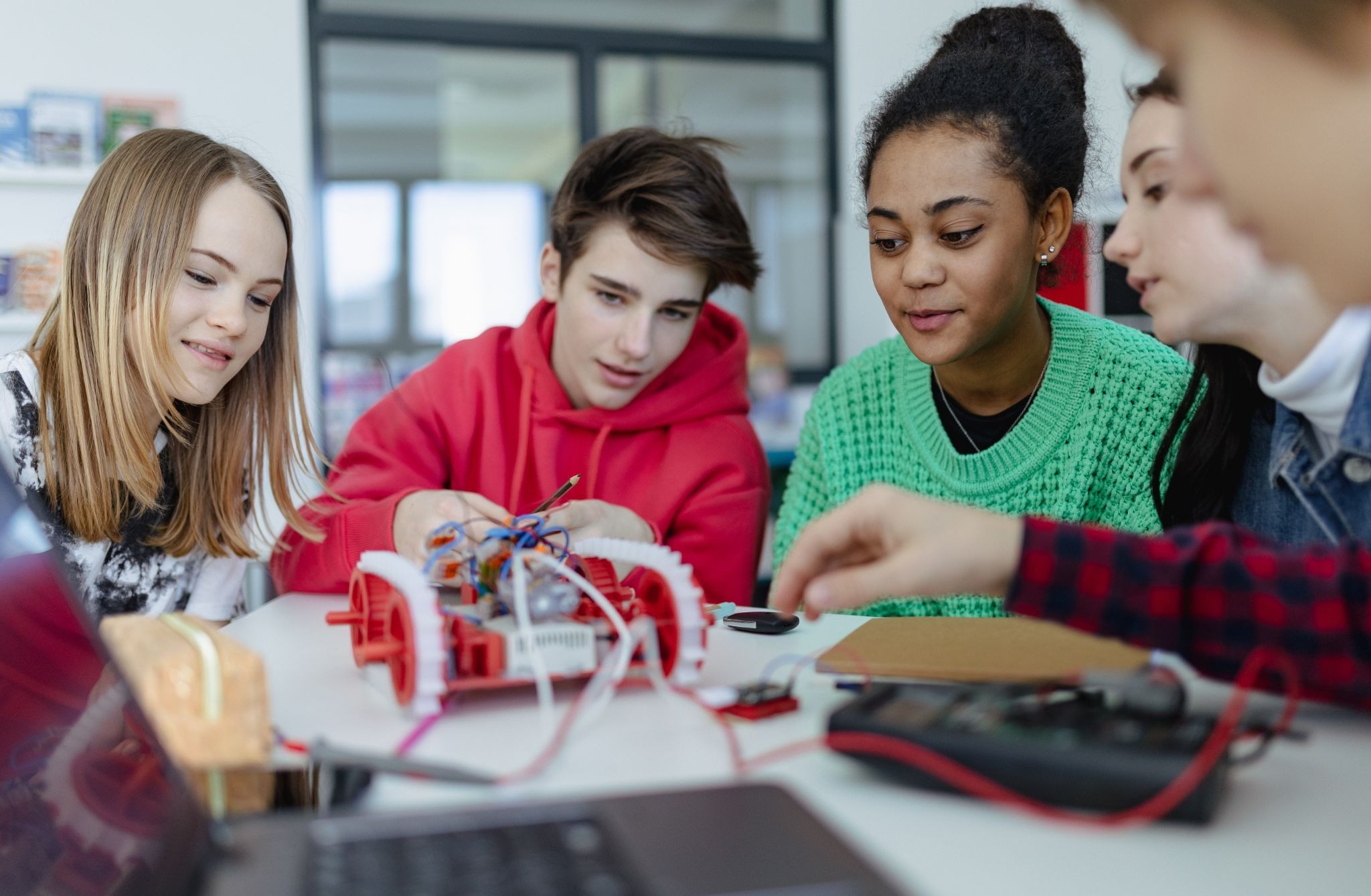Students learning in a group at school.